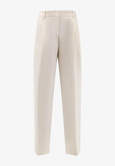 Totême Double-pleat Fluid Pants In Transparent