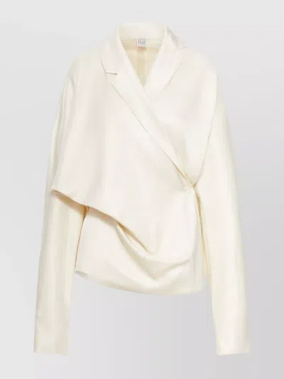 Totême Draped Asymmetric Wrap Blouse Detail In White