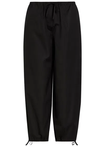 Totême Toteme Drawstring Barrel-leg Cotton Trousers In Black