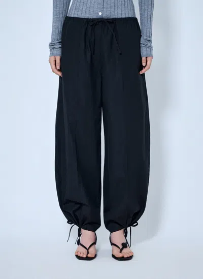Totême Drawstring Cotton Trousers In Black