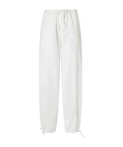 Totême Parachute Lyocell-blend Tapered Pants In White