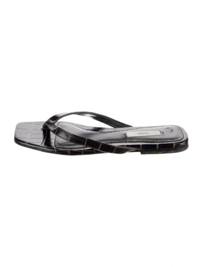 Pre-owned Totême Embossed Leather Animal Print Flip Flops In Black