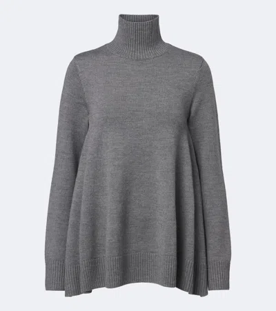 Totême Flared Wool Turtleneck Sweater In Grey