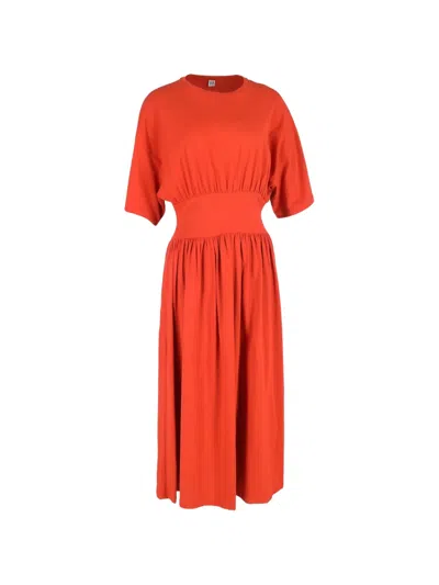 Pre-owned Totême Gathered Jersey Midi Dress In Orange