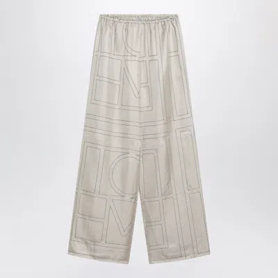 Totême Toteme Ivory Monogram Silk Pajama Trousers For Women In White