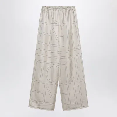 Totême Toteme Ivory Monogram Silk Pajama Trousers In Multi