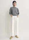 Totême Toteme Kick Flared-leg Denim Jeans In White