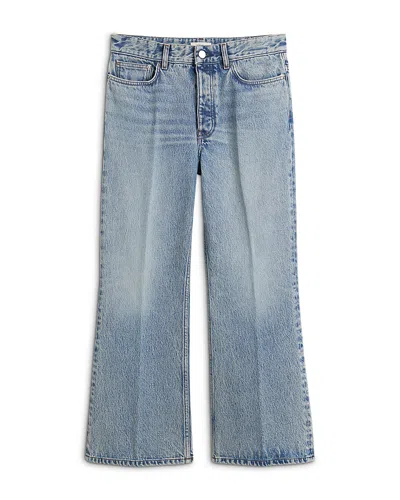 Totême Kick Flare Jeans In True Vintage In Blue