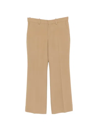 Totême Kick Pressed-crease Flared Trousers In Multi