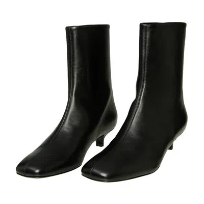 Totême Leather Ankle Boots With A Back Zipper In Black