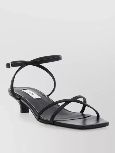 Totême Leather Crossover Mules In Black