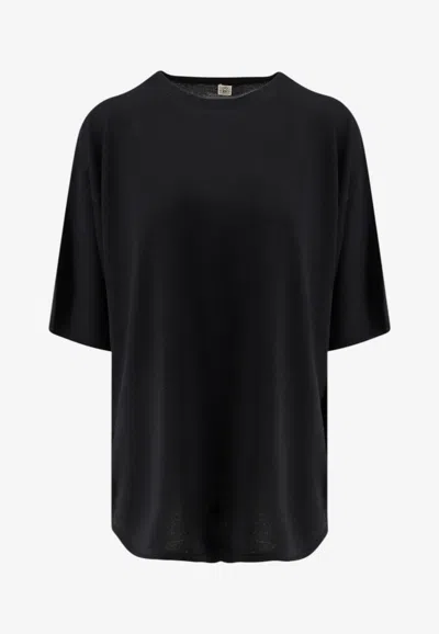 Totême Longline Wool Knit Top In Black