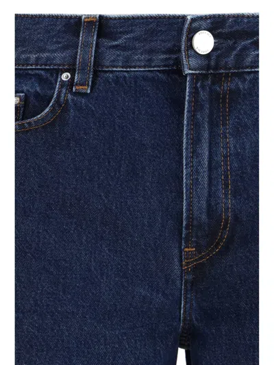 Totême Toteme Low-rise Cotton Denim Jeans In Indigo