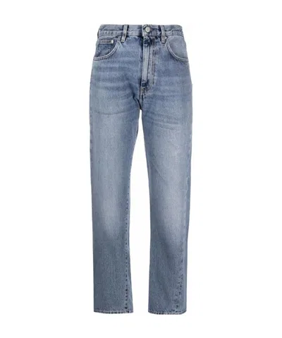 Totême Mid-waist Twisted Jeans In Blue