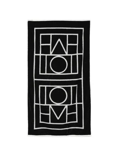 Totême Toteme Monogram Beach Towel In Black