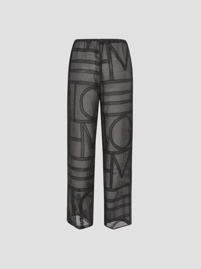 Totême Toteme Monogram Printed Pj Bottoms In Black