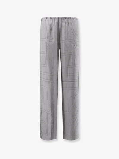 Totême Monogram Flannel Trousers In Gray