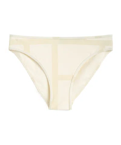 Totême Monogram Printed Swim Shorts In Neutral