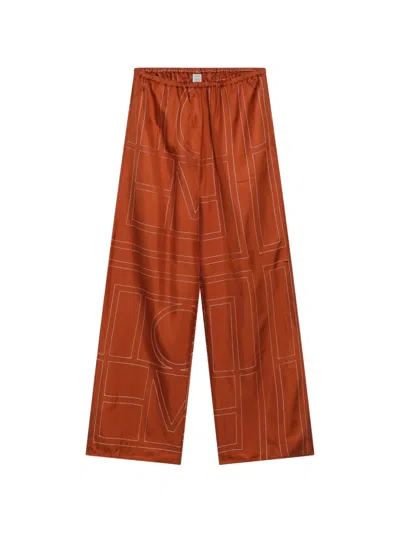 Totême Monogram Silk Pijama Bottoms Terracotta In Orange