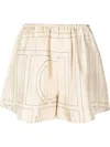 Totême Toteme Monogram Silk Shorts