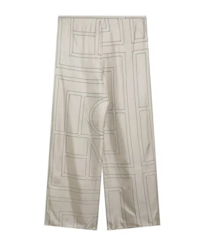 Totême Monogram Silk Trousers In Neutral