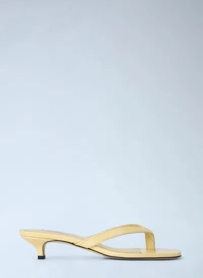 Totême Naplack Heeled Flip Flops In Yellow