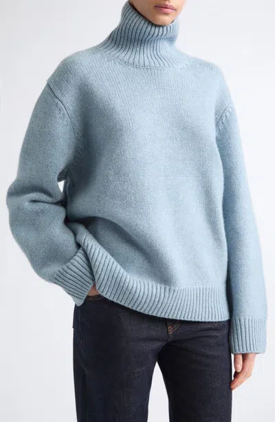 Totême Toteme Oversize Lambswool Turtleneck Sweater In Blue