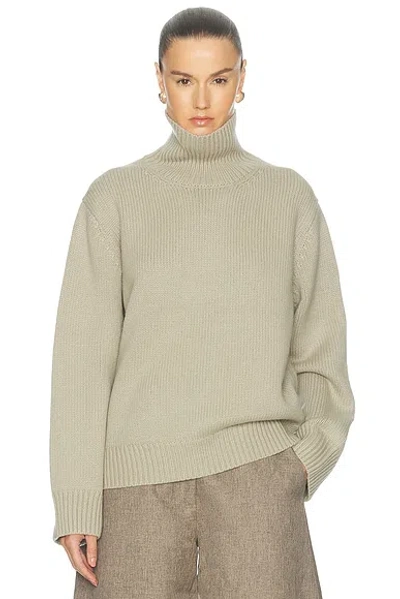 Totême Oversized Lambswool Turtleneck Sweater In Green