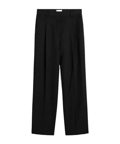 Totême Pleat Detailed Trousers In Black