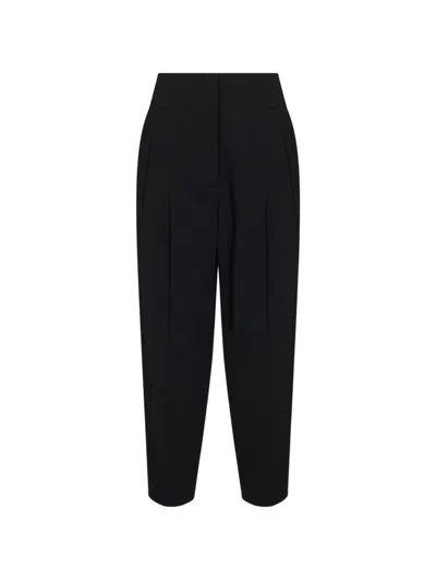 Totême Pleated Woven Tapered Pants In Black