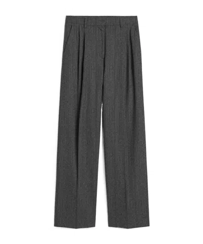 Totême Pleated Herringbone-pattern Trousers In Gray