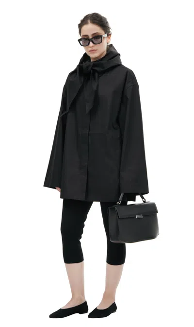 Totême Raincoat With A Cowl Hood In Black