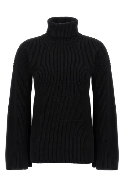 Totême Ribbed Wool Turtleneck Jumper In Black