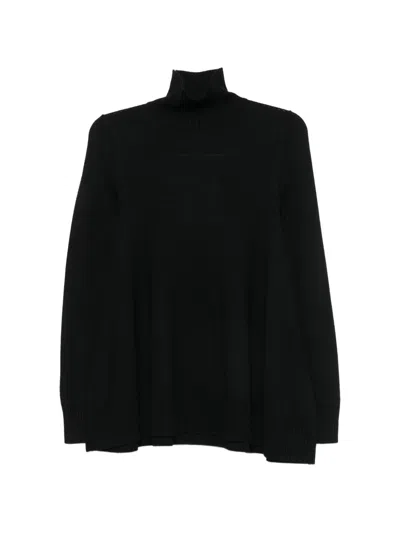 Totême Ribbed-knit Turtleneck Sweater In Black