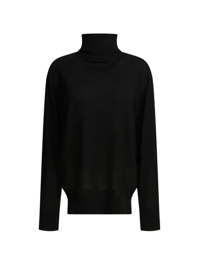Totême Roll-neck Wool Sweater In Black