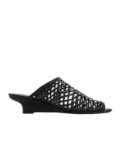 Totême Woven Leather Wedge Mules In Black