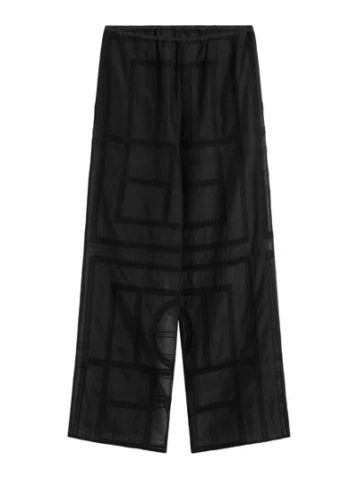 Totême Semi-transparent Silk Trousers With Monogram In Black
