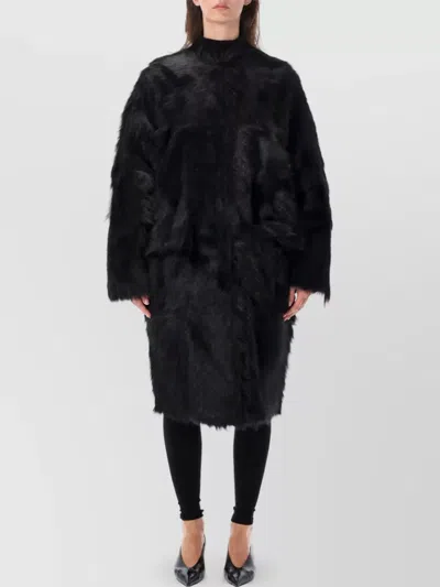 Totême Collarless Shearling Coat In Black