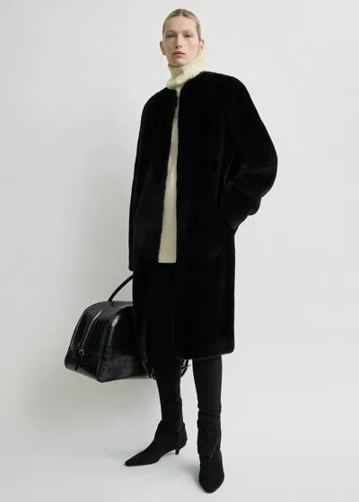 Totême Shearling Midi Coat Black