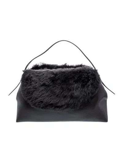 Pre-owned Totême Shearling T-lock In Black