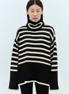 Totême Toteme Striped Wool Cotton Turtleneck In Black