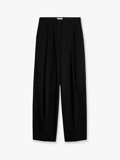 Totême Single Pleat Cotton Trousers In Black