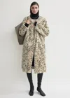 Totême Stracciatella Shearling Coat Black/white In Neutral
