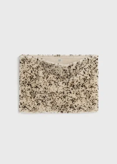 Totême Stracciatella Shearling Muff Black/white In Brown