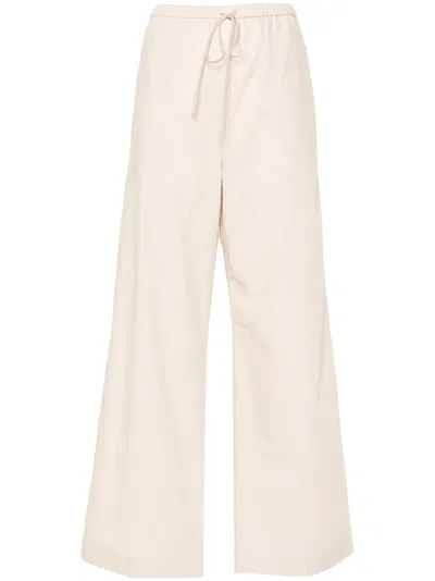 Totême Toteme Tie-waist Fluid Trousers In Neutral