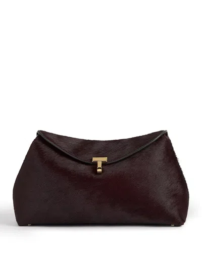 Totême T Lock Calf Hair Convertible Clutch In Burgundy