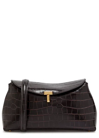 Totême Toteme T-lock Crocodile-embossed Leather Clutch In Brown