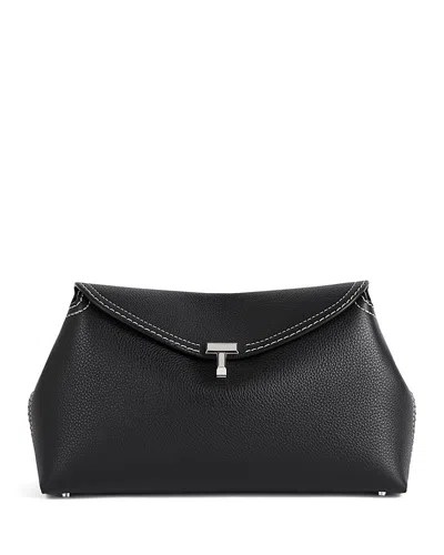 Totême T-lock Grained-leather Clutch In Black
