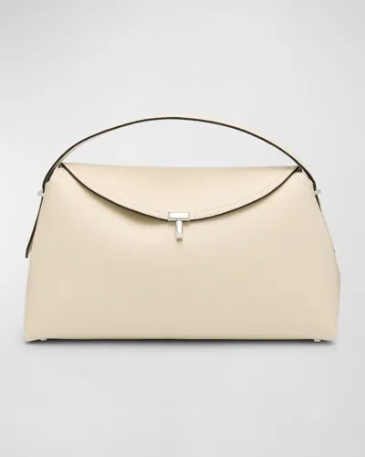 Totême T-lock Top Handle Bag In Pebble Grain Leather In Milk