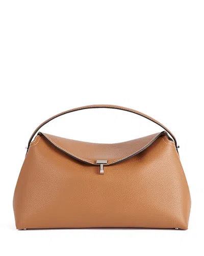 Totême T-lock Grained-leather Top Handle Bag In Tan In Burgundy
